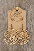 Laser-cut wood floral medallion earrings with circular design and natural wood finish