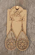 Laser-cut wood teardrop earrings featuring intricate mandala design and natural grain