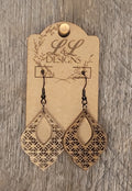 Moroccan-inspired laser-cut wood earrings with geometric lattice pattern and natural finish