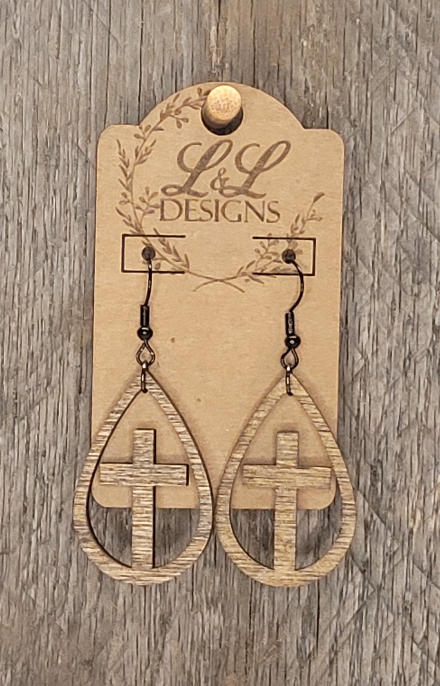 Teardrop wood earrings with cross cutout design and lightweight construction