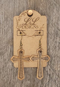 Layered wood cross earrings featuring textured detail and handcrafted finish