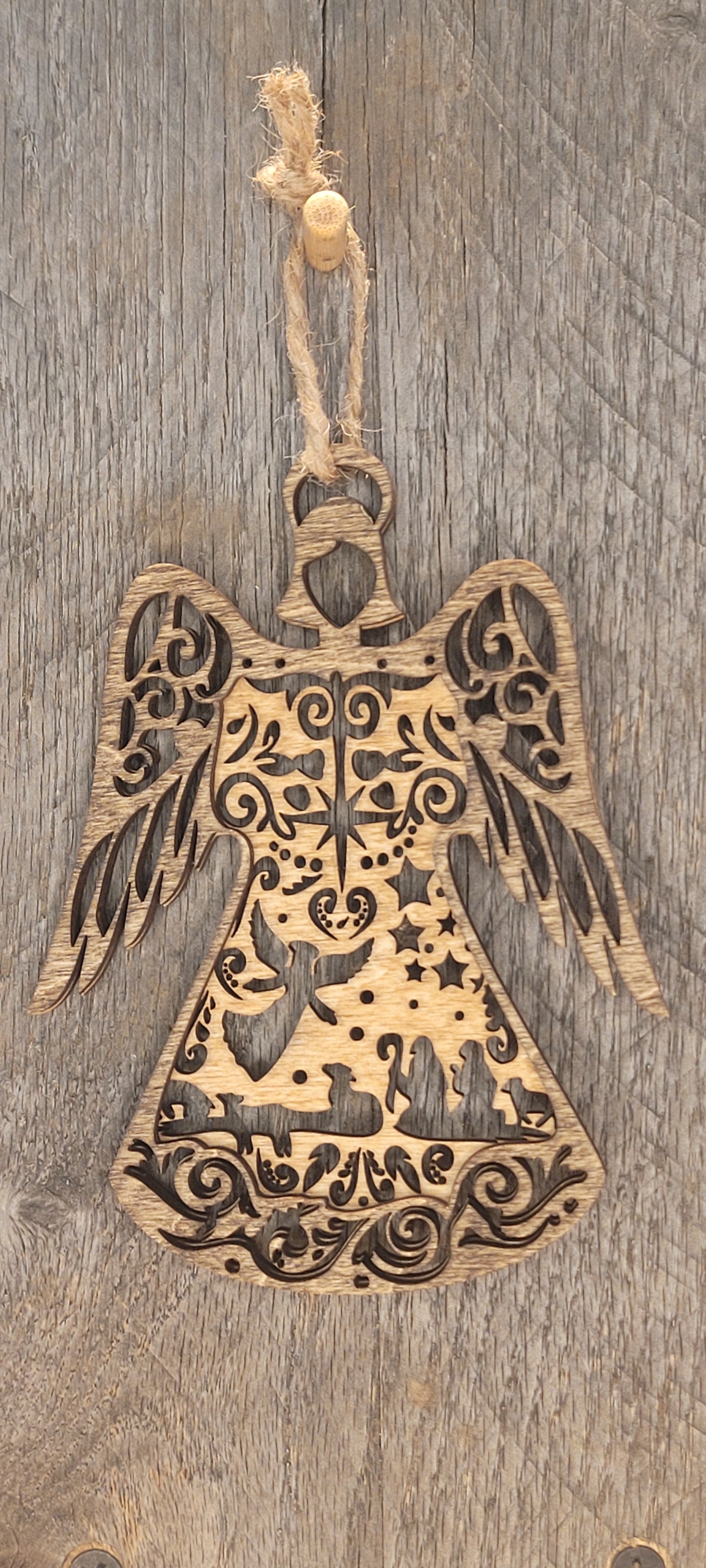 Two-toned laser-cut wood angel ornament with natural and stained finish