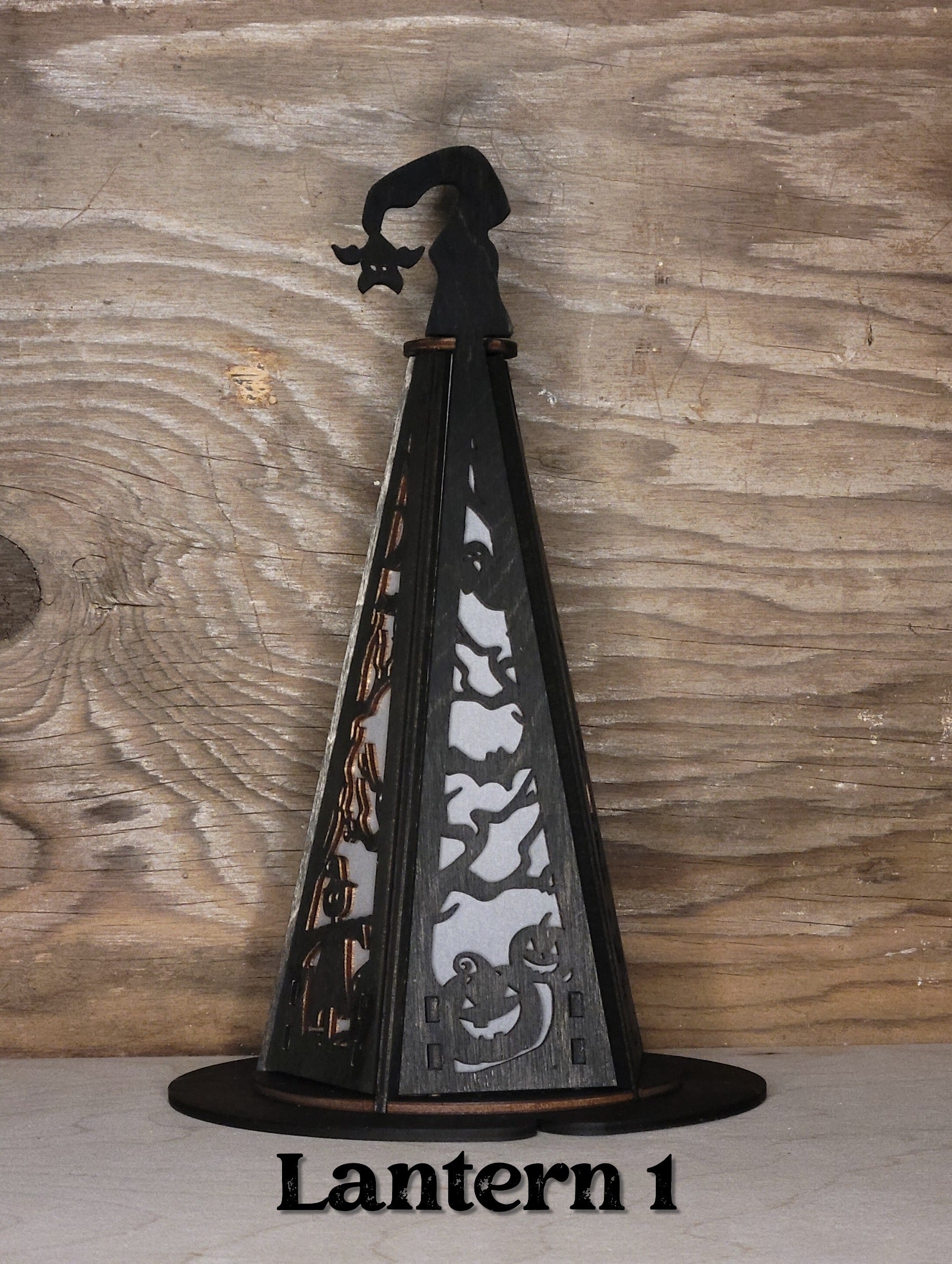 Witches hat lantern style 1 in black wood finish, alternate angle showing pointed hat silhouette
