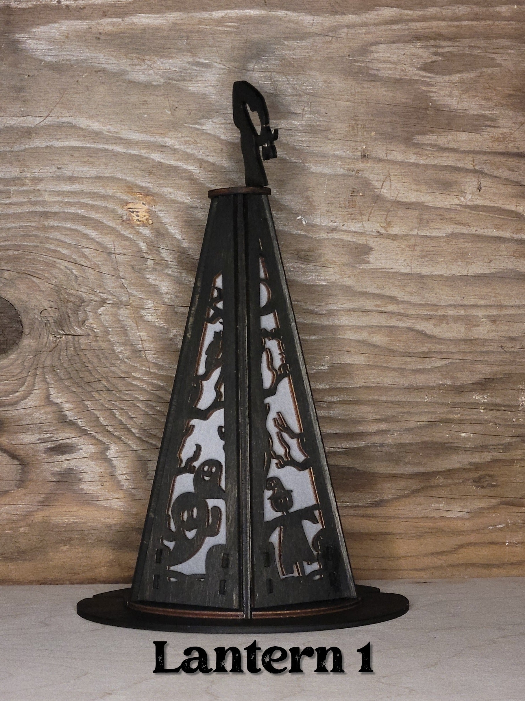 Witches hat lantern style 1 in black wood finish, alternate angle showing pointed hat silhouette
